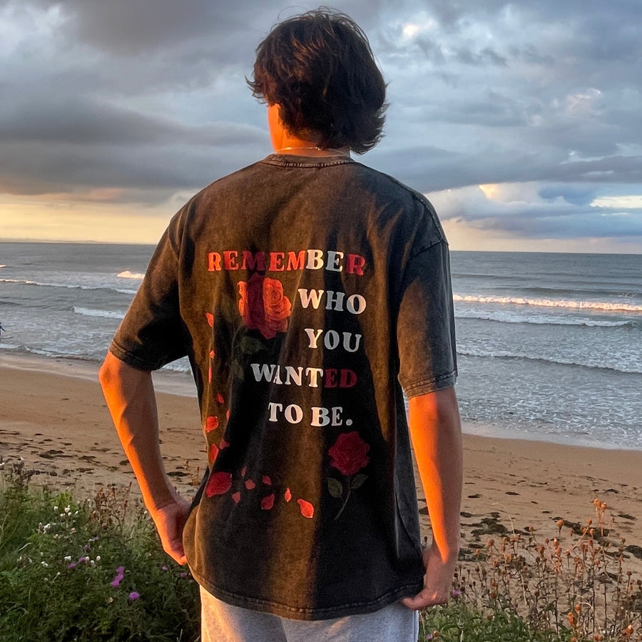 A Trix Collective tee worn outdoors